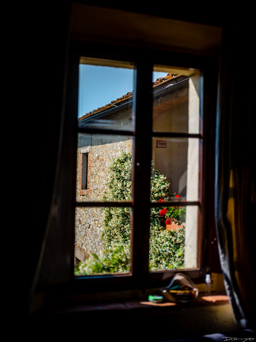 Photos from a trip through Italy in Summer of 2023. Locations include Rome, Florence, Tuscany, Castello di Bossi in Chianti, Siena, San Gimignano, Sirmione on Lake Garda, Bologna, Gudon, Italian Dolomites, Seceda, Cadini di Misurina, and Venice.